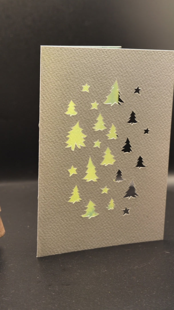 Modèle de Papercut spécial Noël - forêt de sapins