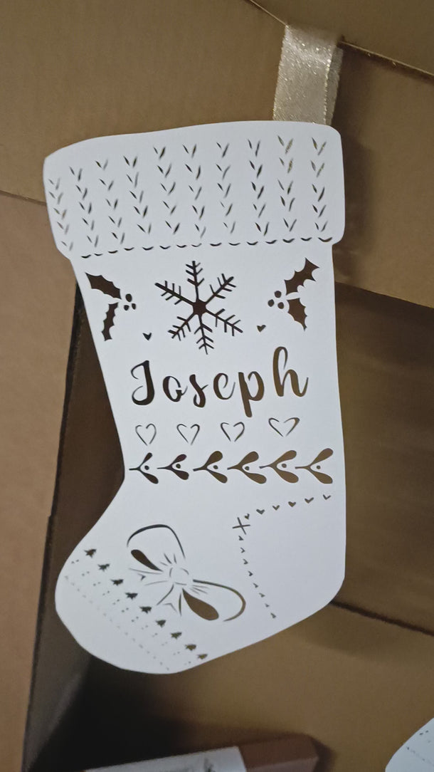 cadeau personnalisé pour Noël, papier découpé représentant une chaussette de Noël, vidéo en mouvement